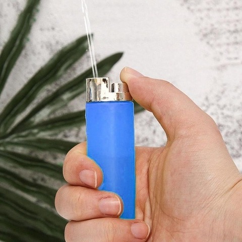 1PCS Random Color Funny Party Trick Gag Gift Water Squirting Lighter Fake Lighter Joke Prank Trick Toy Randomly send 1pcs ► Photo 1/3