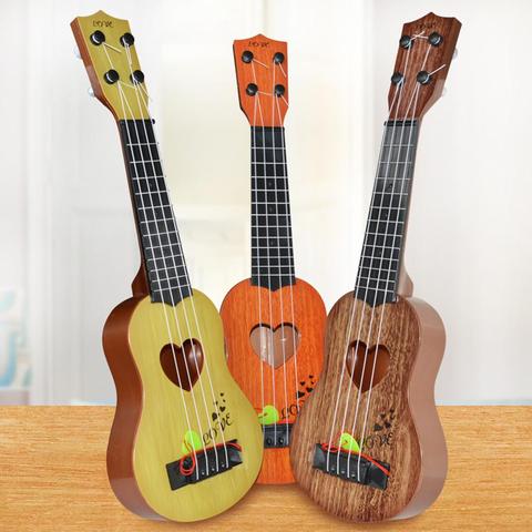 Kid Solid Color Wooden Ukulele Hawaiian Guitar Fretboard Stringed Instrument Toy ► Photo 1/6