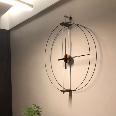 Spain  simple modern home art clock creative light luxury wall clock minimalist personality living room clock ► Photo 1/5