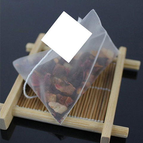 100pcs/lot Corn Fiber Pyramid Tea Bags Sealed Heat Biodegradable Infuser Tea Filter Bag ► Photo 1/4