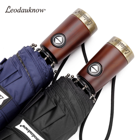 Leodauknow Three folding fully automatic fashion Uv protection metal solid wood handle 10k  men's sunny and rainy umbrella. ► Photo 1/6