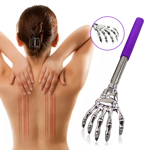 Back Massage Using Medical Steel Metal Massager Scraper. Lady