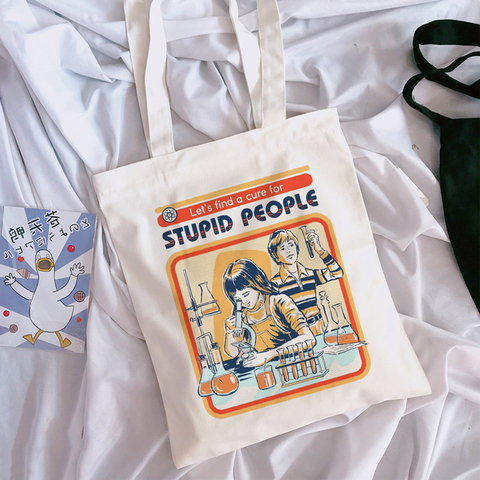 Let's find a cure for stupid people Devil Letter Print Women Canvas Large Capacity Vintage Harajuku Cartoon Casual Shoulder Bag ► Photo 1/6