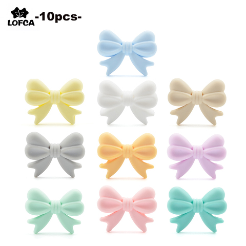 Bowknot 10pcs/lot Silicone Beads DIY Food Grade Silicone Teething Pacifier Cute Shaped Silicone teether Holder Accessories ► Photo 1/6