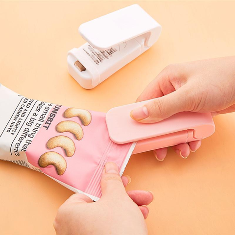 Portable Mini Sealer Home Heat Bag Plastic Food Snacks Bag Sealing Machine Food Packaging Kitchen Storage Bag Clips Wholesale ► Photo 1/6