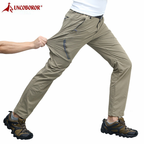 Stretch Casual Pants Men Spring Summer Multifunction Elastic Ultra-Thin Breathable Trousers Waterproof Tactical Cargo Pants 8XL ► Photo 1/1