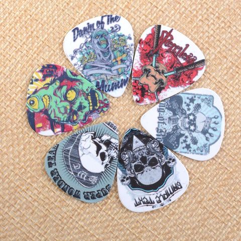 10pcs Plastic Skull Pattern Guitar Paddle Picks Thickness 1.0mm Bass Guitar Pick Parts Musical Instrument Accessories ► Photo 1/6