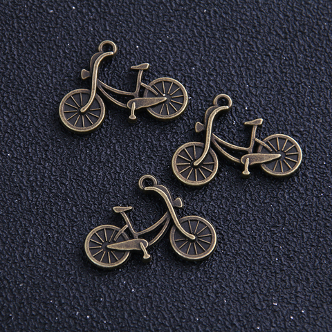10pcs/lot 19*26mm Wholesale Vintage Bronze Alloy Metal Mini Bicycle Charm Jewelry Pendants Makings ► Photo 1/2