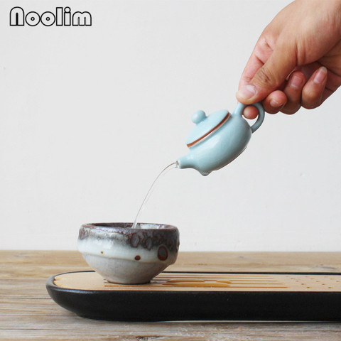 1pc Mini Kiln Porcelain Teapot Ceramic Fingertip Tea Pot Creative Small Tea Pet Teahouse Ornaments Kitchen Kung Fu Kettle ► Photo 1/6