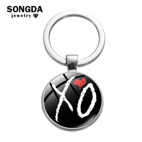 SONGDA High Quality X.O Keychain Pop Singer The Weeknd Art Poster Trendy Print Glass Cabochon Key Ring Car Key Chain Handicrafts ► Photo 1/6