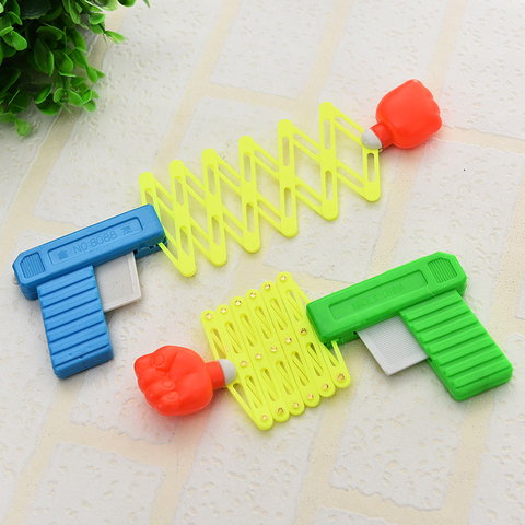 Retractable Fist Shooter Trick Toy Gun Funny Child Kids plastic Party Festival Gift  For fun Classic Elastic Telescopic Fist Toy ► Photo 1/5