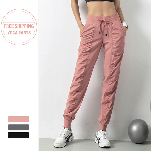 Loose Sports Pants Women Running Yoga Pants Pocket Elastic Waist Fitness Trousers  Gym Pants Sport Training Trouser Ladies - Price history & Review, AliExpress Seller - TaurusSport Store