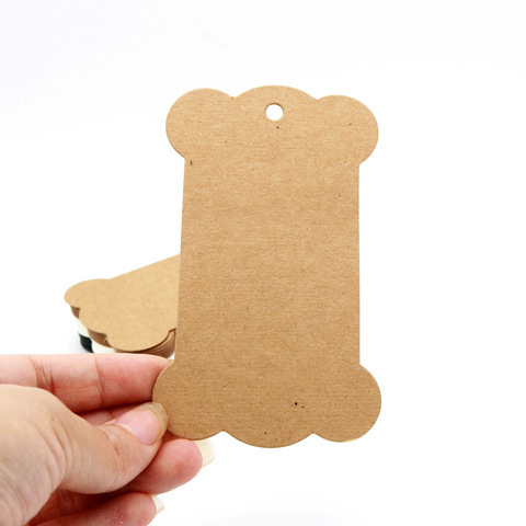 50pcs/Lot 6.2x10.5cm Kraft Blank Bone Shape Packaging Hang Tags Wedding/Birthday Party Candy Boxes Price Tags Labels ► Photo 1/5
