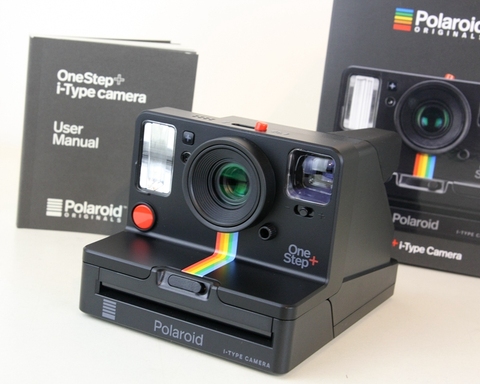 Polaroid Originals Onestep+ White and Black rainbow camera with i-type 600 film and Bluetooth is connected to the phone. ► Photo 1/6