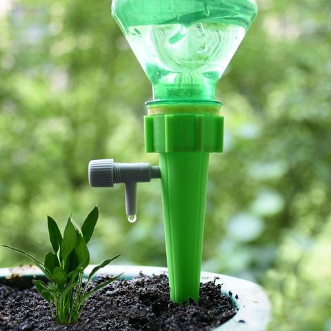 Drip Irrigation Automatic Plant Waterers System Adjustable drip water spikes taper plants pot watering for Coke bottles 1pcs ► Photo 1/6