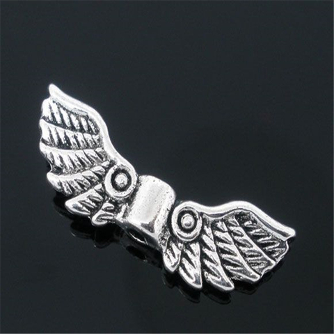 DoreenBeads Retail 50 Silver Color Angel Wing Charm Spacers Beads 22x7mm ► Photo 1/3
