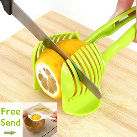 https://alitools.io/en/showcase/image?url=https%3A%2F%2Fae01.alicdn.com%2Fkf%2FHTB1KgojROLaK1RjSZFxq6ymPFXaV%2F1PC-Plastic-Green-Manual-Slicers-Tomato-Slicer-Fruits-Cutter-Tomato-Lemon-Cutter-Assistant-Lounged-Cooking-Holder.jpg_480x480.jpg