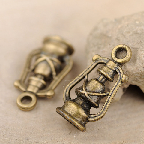 High Quality 10 Pieces/Lot 11mm*20mm Antique Bronze Plated Jewelry Handmade Vintage Oil Lamp Charms ► Photo 1/2