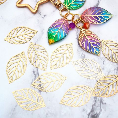 100 pcs/Pack Openwork Leaf Metal Flower Frame Pendant Charm DIY UV Resin Necklace Jewelry Making ► Photo 1/6
