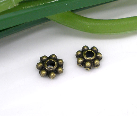 DoreenBeads 1000 Bronze Tone Tiny Daisy Spacers Beads 4mm Findings ► Photo 1/3