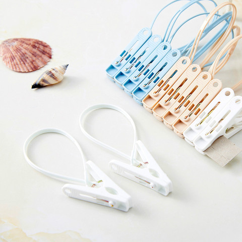12Pcs Mixed color plastic Clothes Pegs storage Clip Portable Home Hangers for clothes hanger drying rack Towel clothes pins ► Photo 1/6
