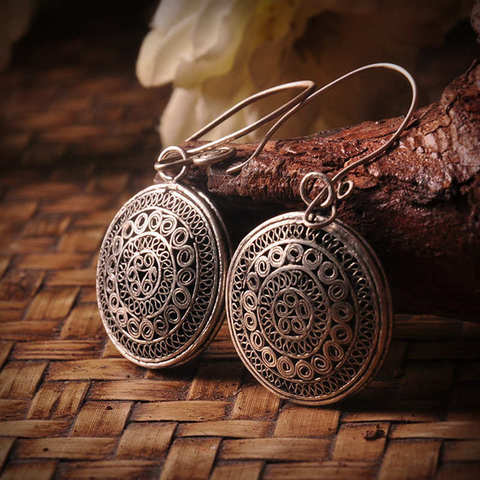 E077 Miao Hand Jewelry Hand Wrapped Copper Silk Big Circle Hollow Earrings ► Photo 1/3