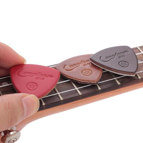 Dragonpad 3pcs Guitar Picks Pickup Leather Guitar Picks Artificial Leather Triangle Picks for Ukulele Guitar Banjor Random Color ► Photo 1/6