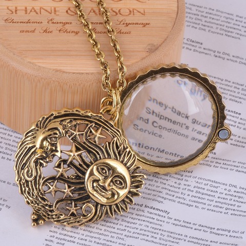 magnifier glass pendant sun with moon and stars necklace antique gold jewelry opens and closes ► Photo 1/3