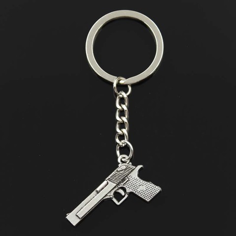 Fashion Gun Browning Pistol 45x20mm Pendant 30mm Key Ring Chain Bronze Silver Color Men Car Gift Souvenirs Keychain Dropshipping ► Photo 1/5