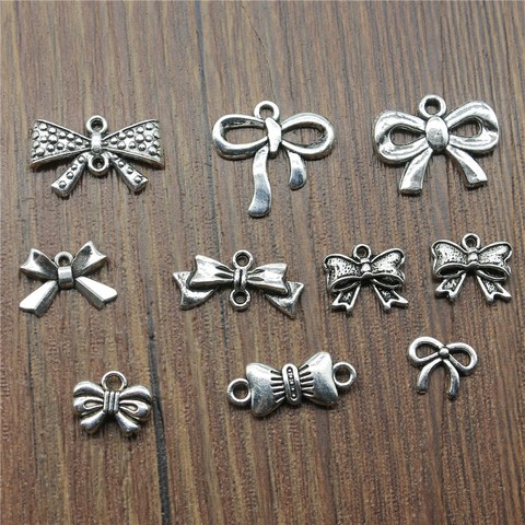 30pcs/lot Charms Tiny Bow Antique Silver Color Bowknot Charms Jewelry Findings DIY Bowknot Charms Wholesale ► Photo 1/2