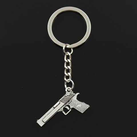 New Fashion Keychain 45x20mm Gun Browning Pistol Pendants DIY Men Jewelry Car Key Chain Ring Holder Souvenir For Gift ► Photo 1/6
