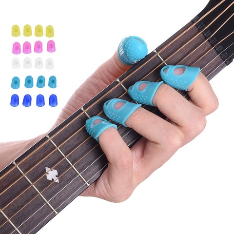 12 Pcs Thin Medium Celluloid Guitar Thumb Picks Finger Cap Protect Fingers for Splicing Line Pressing Elastic Ukulele Finger Hat ► Photo 1/6