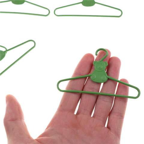 10 PCS / Lot Lovely Green Hangers Mini Cute Wardrobe Dress Coat Clothes Plastic Accessories For babi Doll Dollhouse Gift Toy ► Photo 1/6