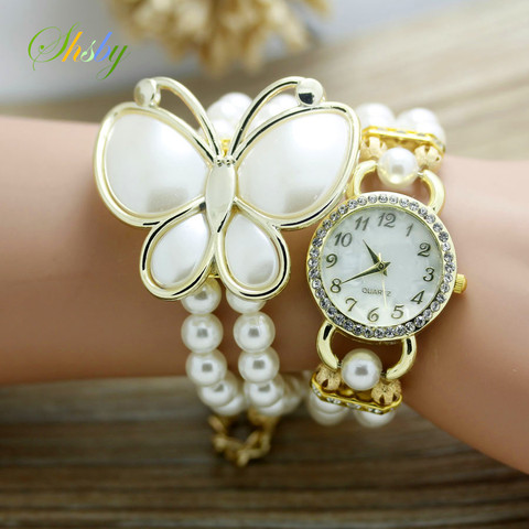 shsby New Fashion Women dress Watches Ladies pearl chain white flower bracelet quartz wristwatches Women Rhinestone Watches ► Photo 1/6