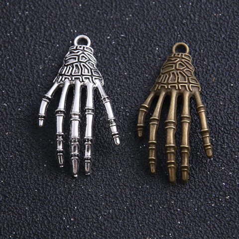 8pieces/lot  20*36mm Free shipping  Vintage Two Color Alloy Skeleton Hand Charms Jewelry Skull Charms Findings ► Photo 1/6