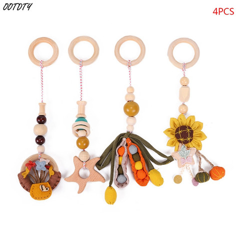 4 Pcs/Set Baby Play Gym Frame Stroller Hanging Pendants Wooden Ring Teether Molar Teething Nursing Rattle Toys Infant Room Decor ► Photo 1/6