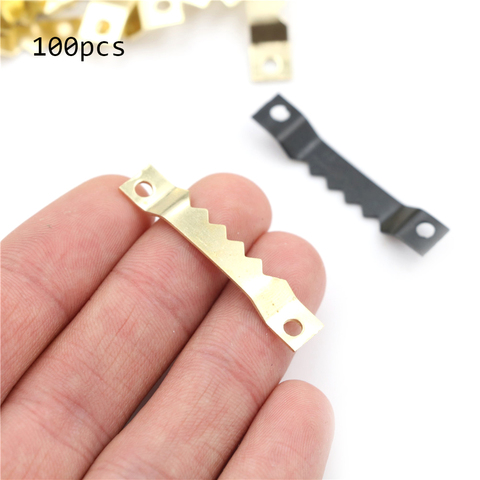 100pcs Wholesale High Quality Black No Nail Picture Frame Hooks Saw Tooth Sawtooth Hangers ► Photo 1/6