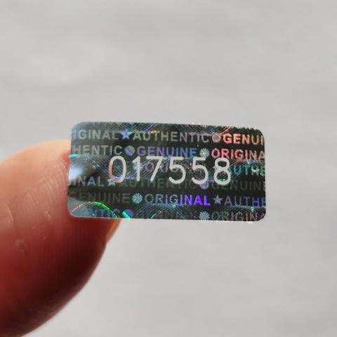 2000psc 20mmx10mm Holographic Warranty Void Sticker Tamper Proof Transparent Serial Number Security Label Can Be Customized ► Photo 1/6