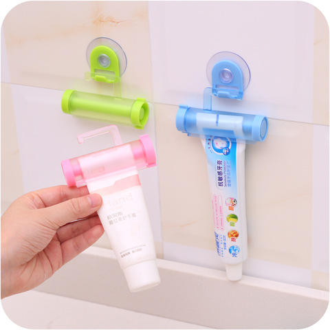 Plastic Rolling Tube Squeezer Toothpaste Dispenser Sucker Holder Dental Cream Bathroom Manual Syringe Gun Dispenser ► Photo 1/4