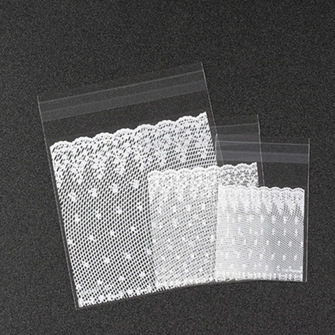 100pcs plastic transparent white lace candy biscuit gift bag and DIY self-adhesive bag wedding birthday party packaging bag ► Photo 1/6