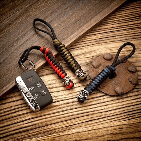 Outdoor Camping Equipment Punk Skull Metal Keychain Lanyard Handmade Woven Survival Paracord Rope Kyechain Keyring Jewelry ► Photo 1/6