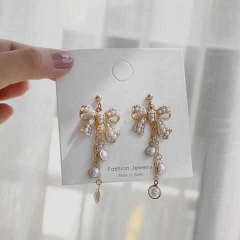 Korean Bow Shape Imitation Pearl Clip on Earrings 2022 Rhinestone Bowknot Long Pearl Tassel Clip Earrings Without Piercing Women ► Photo 1/6