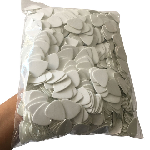 Wholesale Lots of 500pcs Solid White Celluloid Guitar Picks Plectrums 0.46mm / 0.71mm / 0.96mm / 1.5mm ► Photo 1/4