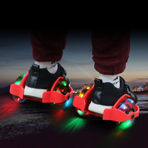 Zapatos de patín con tacón de rueda para niños con luz intermitente LED, ruedas calientes ajustables, correa de polea pequeña de remolino colorido para deporte IA32 ► Foto 1/6