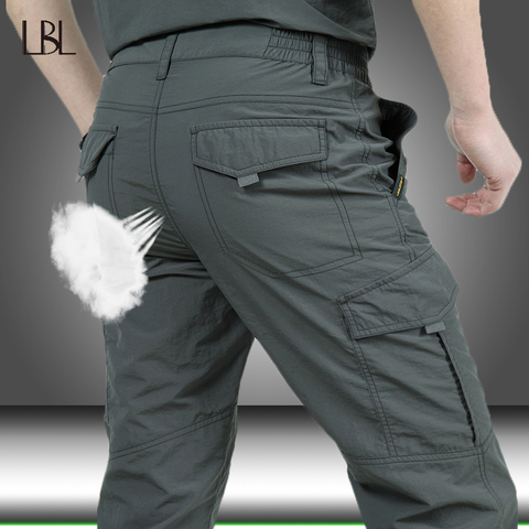 Pantalones tácticos de estilo militar para hombre, pantalón informal, impermeable, de secado rápido, para verano ► Foto 1/6