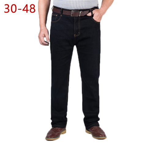 30-48 de gran tamaño clásico vaqueros holgados para los hombres primavera otoño Casual rectos Stretch marca cremallera de negocios negro pantalones de mezclilla ► Foto 1/6