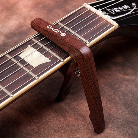 JOYO JCP-01-Capo de plástico para guitarra eléctrica acústica, 6 cuerdas, colores de madera, accesorios para guitarra ► Foto 1/5