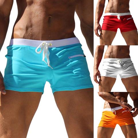 Bañadores de Color sólido para hombre, ropa de baño ajustada con bolsillos y cordón, pantalones cortos de playa ► Foto 1/6