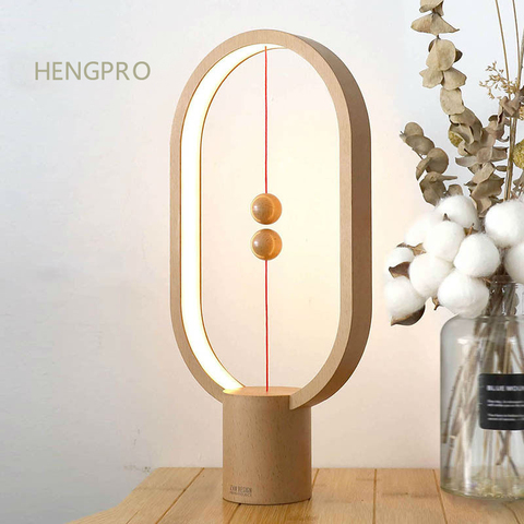 ¡Novedad de 2022! Lámpara LED de escritorio con interruptor magnético de aire medio elíptico portátil de luz nocturna de equilibrio HENGPRO, atenuación táctil para decoración del hogar ► Foto 1/6