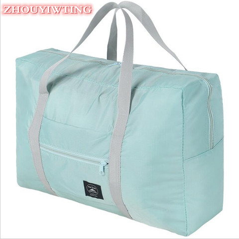 Bolso de viaje plegable de nailon para mujer, bolsa de viaje Unisex, resistente al agua, de gran capacidad, plegable, para equipaje, organizador de cubos de embalaje ► Foto 1/6